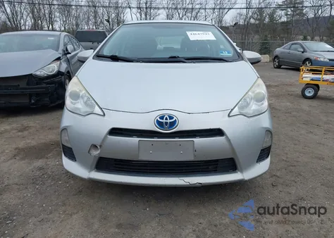 2014 Toyota Prius C Two from USA, damaged, VIN JTDKDTB38E1567452